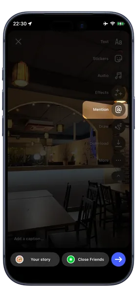 Instagram Story editor with the Mention option highlighted, ready to tag @viminiapp on a photo taken inside a restaurant.